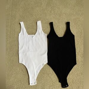 2 bodysuits by Aura